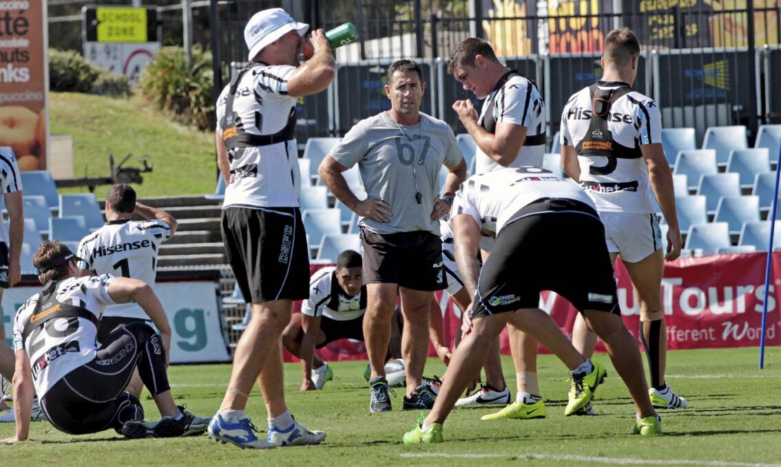 Sharks coach Shane Flanagan (centre) received a 12-month provisional suspension. Picture: SASHA WOOLLEY