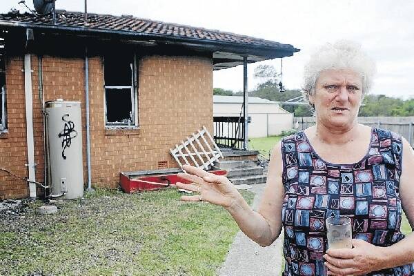Neighbour Judy McDavid whose son, Jason, had been residing in the house, woke to find the building ablaze. Picture: GREG TOTMAN