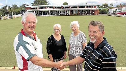 Former Bulli president Bernie Harding and former Bulli bowls organiser Vicki Bott are warmly welcomed by Woonona ladies president Beverley Bloor and assistant Woonona bowls co-ordinator Brian Gibson at Woonona Bowling Club. Picture: ADAM McLEAN