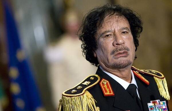 Muammar Gaddafi looks on during a news conference at the Quirinale palace in Rome in June 2009. Photo: MAX ROSSI