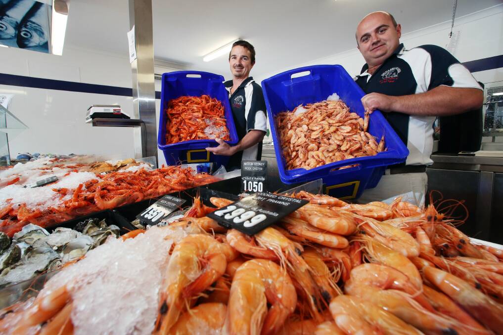 Grant Logue and Charles Bonanno from Harley and John Seafoods in Fairy Meadow. Picture: ADAM McLEAN