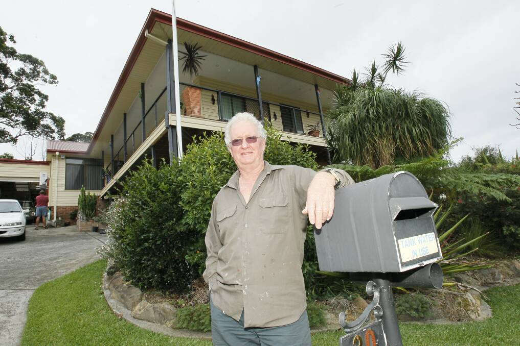 Garry Legge, above, outside the house he calls home in Mayne’s Parade, Unanderra. 