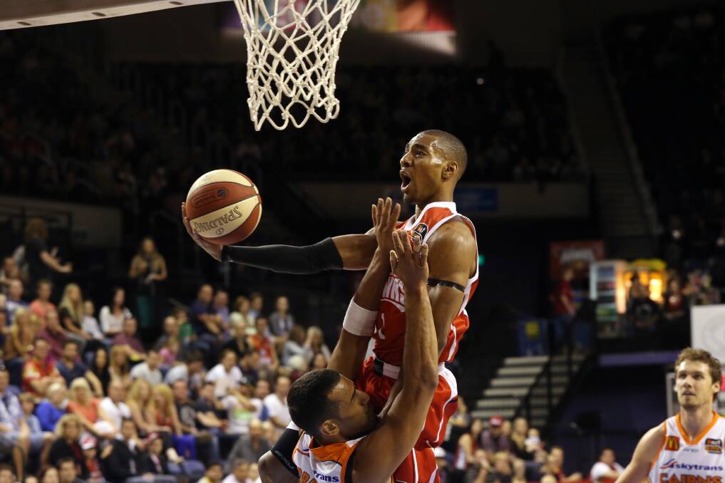 Lance Hurdle shows Hawks do fly in the win against the Taipans.Picture: ADAM McLEAN