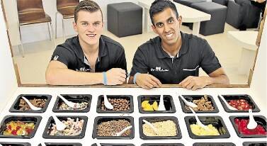 Humming: Entrepreneurs Nick Fabrio and Himi Perera have great faith that their fresh yoghurt business will thrive in the CBD. Picture: GREG ELLIS
