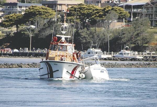 The stricken runabout, brought to Narooma by the Royal Volunteer Coastal Patrol vessel Strathmore on Saturday.  Picture: CHANNEL SEVEN