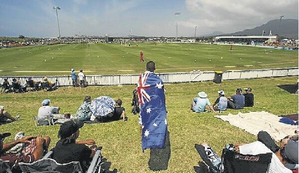 A cricket fan draped in an Australian flag at North Dalton Park.  Pictures: KIRK GILMOUR