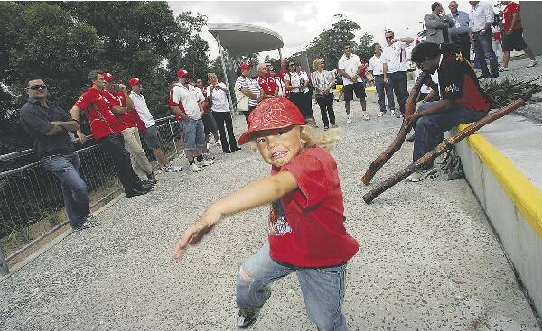 Reginald Kennedy, 3, gets into the swing of St George Illawarra's 2010 NRL season launch on the escarpment at Bulli Tops. Pictures: ADAM McLEAN