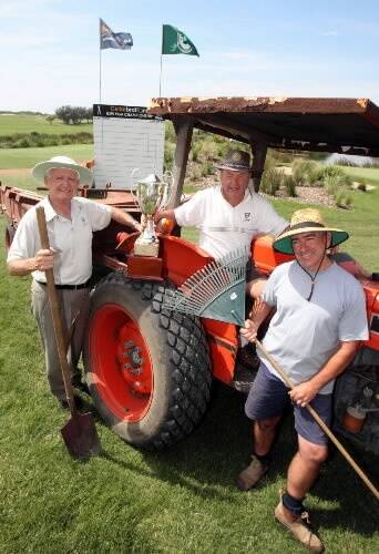 Wollongong Golf Club volunteers Les Gore (left), Peter Oyston and Peter Smith take time out from their work on the course for the NSW PGA.