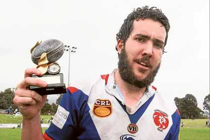 Lions five-eighth Patrick Cronin with his grand final man-of-the-match award.