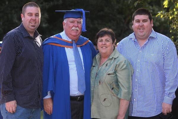 David Campbell with his proud family Ross (left), Edna and Grant Picture: ROBERT PEET