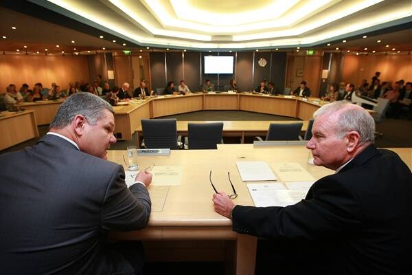 Wollongong City Council general manager David Farmer and new Lord Mayor Gordon Bradbery at the new council's first meeting. Picture: SYLVIA LIBER