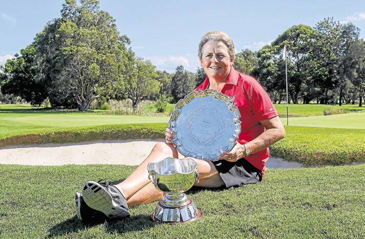 Illowra Tournament winner Colleen Bell with her impressive silverware.Picture: CHRISTOPHER CHAN