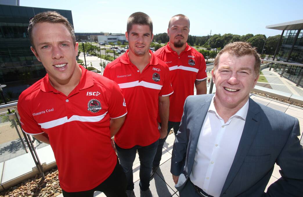 Illawarra Cutters Sam Williams, Charly Runciman and Matt Groat with coach Ian Millward at the club's season launch at the Innovation Campus yesterday.Picture: ROBERT PEET