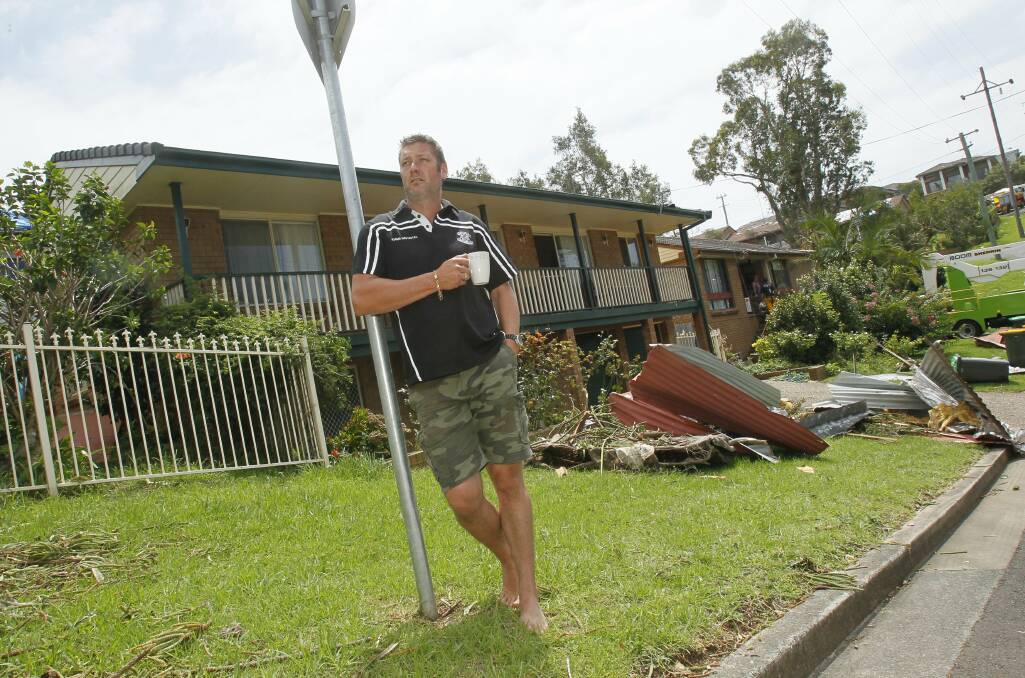 Colley Drive resident Corey Van Leent waits for his rubbish to be collected. Picture: DAVID TEASE