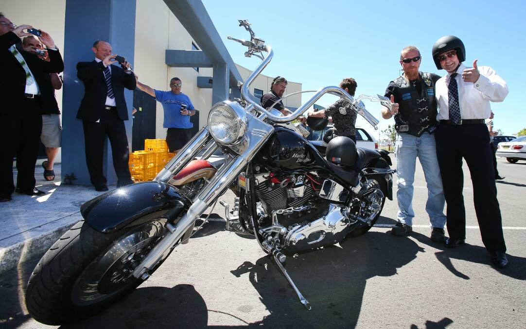 Kevin Andrews (right), with biker Scott Davies. Picture: KIRK GILMOUR