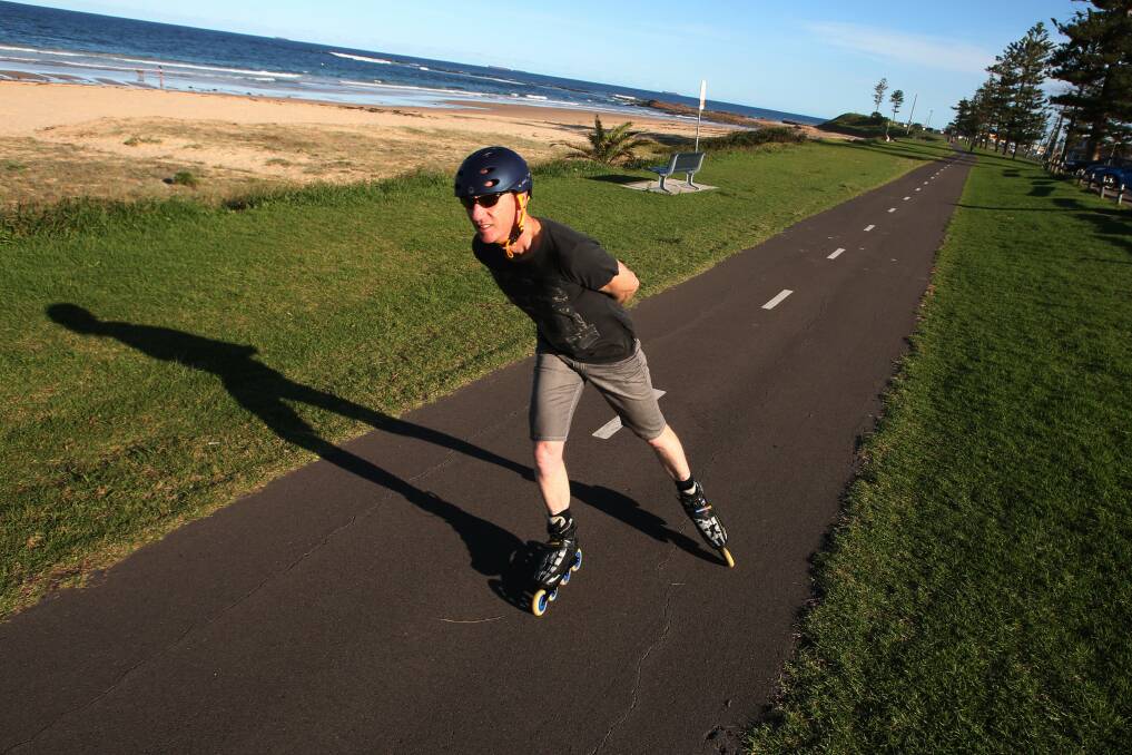 Steve Rouse, pictured taking in the Bulli cycleway, combines in-line skating with cycling and running to keep fit. Picture: KEN ROBERTSON