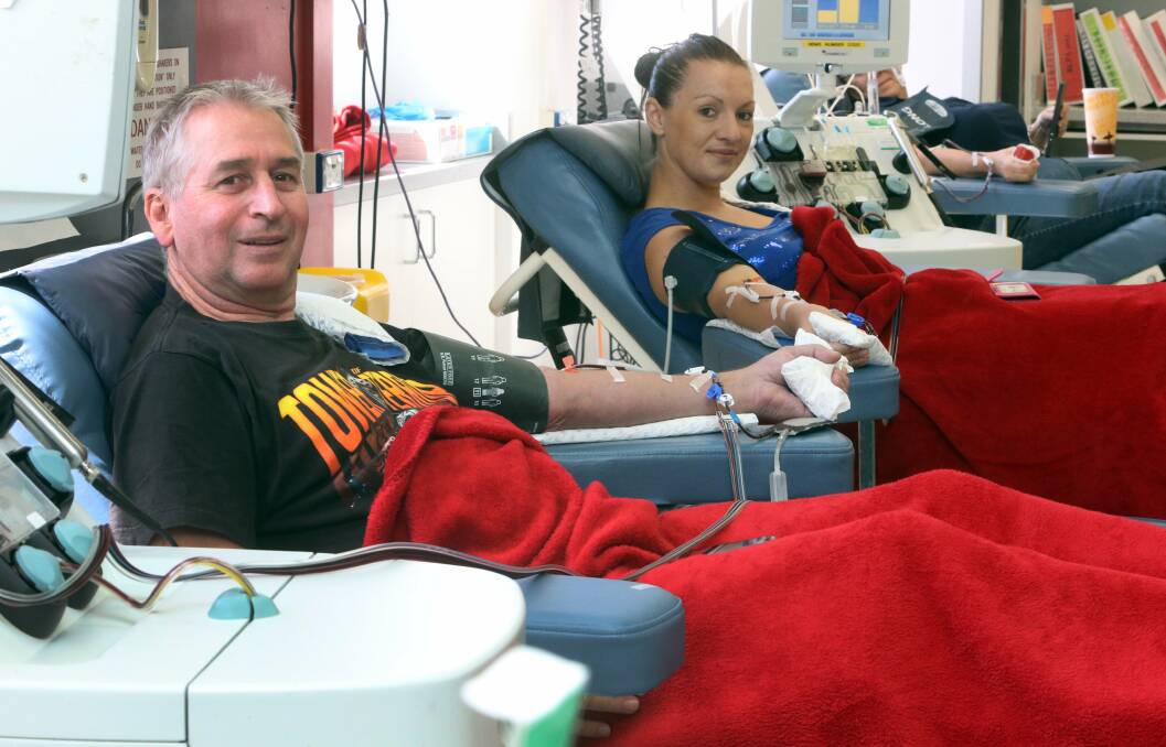 Platelet donors Lewis Barrass, of Dapto, and Leah Raynsford, of Wollongong. Picture: ROBERT PEET