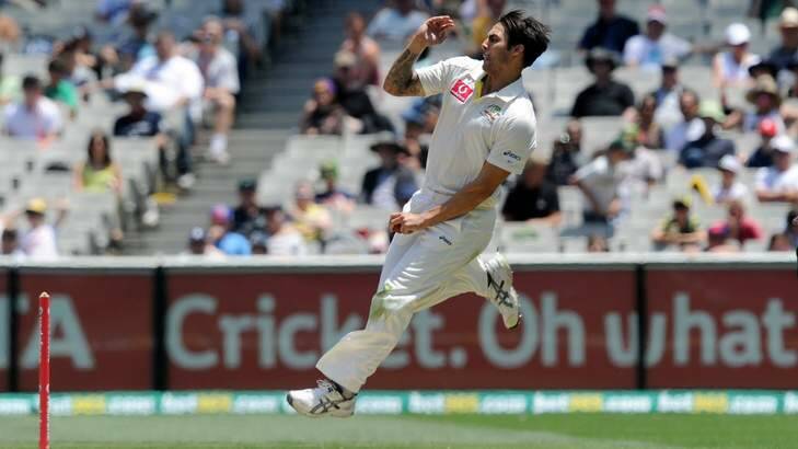 Mitchell Johnson charges in against Sri Lanka at the MCG on Friday. Johnson made 92 not out and captured six wickets for the match.