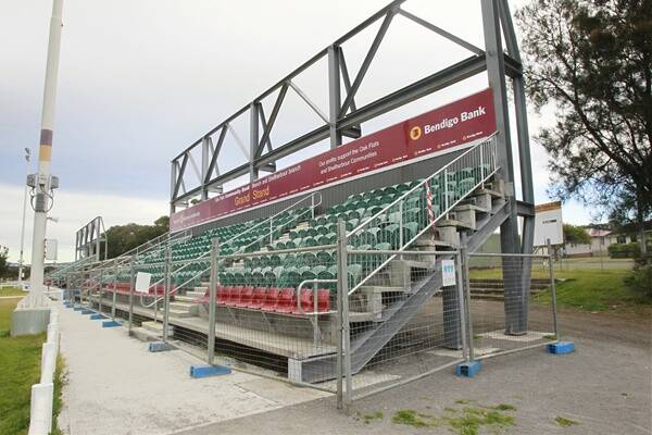 The new 350-seat grandstands at Ron Costello Oval have been blocked off with fencing.