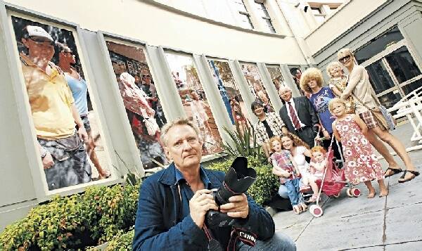Photographer Derek Kreckler, who has created 14 external wall panels for Wollongong City Gallery, with some of his subjects. Picture: KEN ROBERTSON