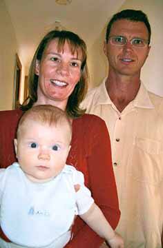 Kylie and Jason Stortz, photographed with their son Harry, before tragedy struck.