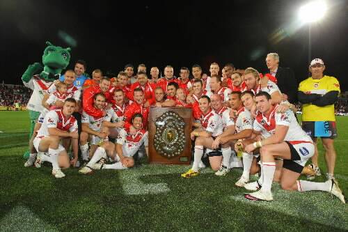 St George Illawarra celebrate their minor premiership with the JJ Giltinan Shield. Picture: DAVE TEASE