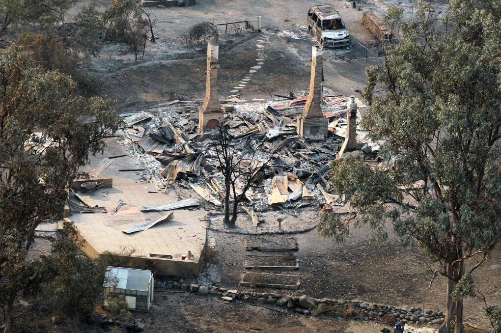 This house in Dunalley, about 40 kilometres east of Hobart, was destroyed by a bushfire. Picture: REUTERS