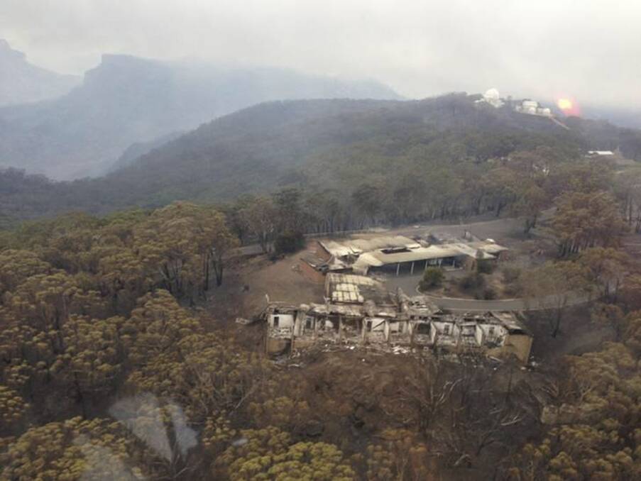 Buildings at the Siding Spring Observatory lie in ruins after a bushfire. Picture: REUTERS/NSW RURAL FIRE SERVICE
