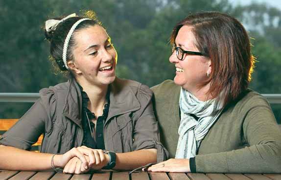 Shannon Fox (left) who is seeking government financial support for full hearing enhancement through dual implants, with her teacher Jenny English, who had her own hearing issues. Picture: ANDY ZAKELI