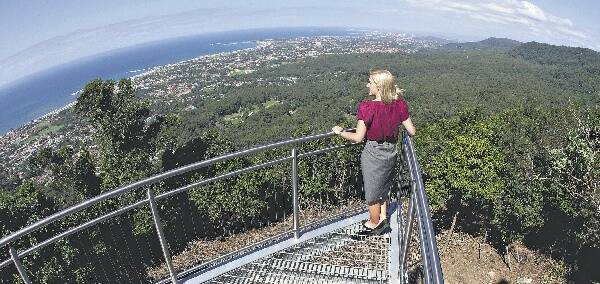 Melissa Jaros takes in the view from the new observation deck at the Southern Gateway Centre at Bulli Tops.Picture: ANDY ZAKELI
