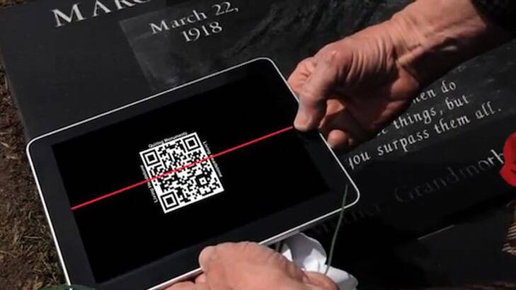 Potential ... a tablet scans a QR code to learn more about the departed.