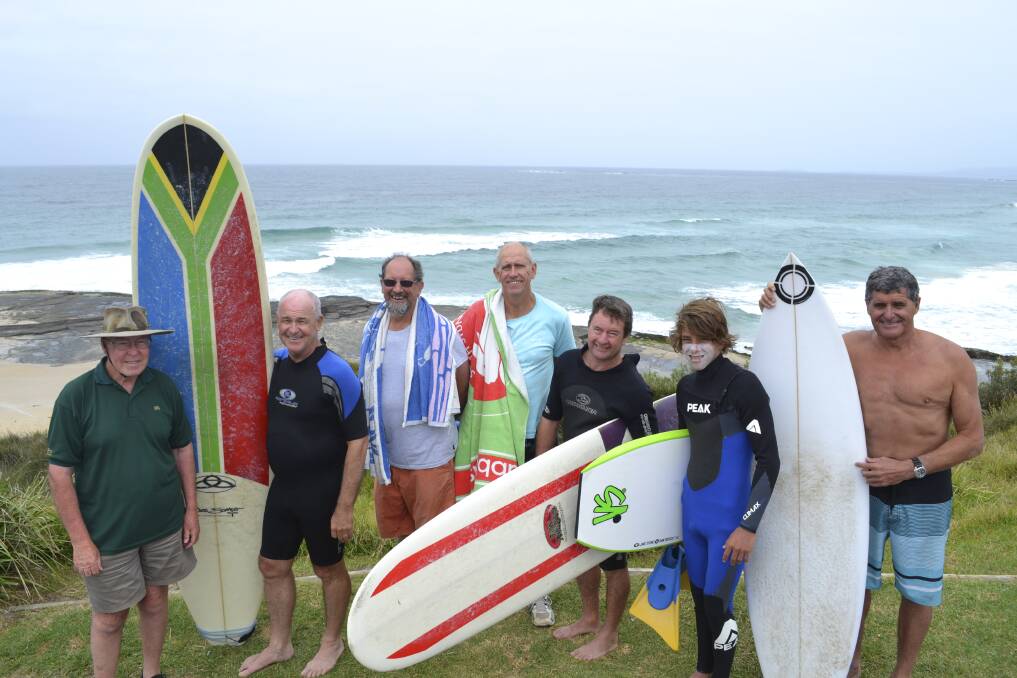 Jeff Kean (left) from St Martin's Anglican Church, Ulladulla, met up with surfers Reverend David Mansfield, Ron Balderston, Pat Kennedy, Lloyd Zietsch, Ben Collins and Gordon Hunter before they hit the waves at Racecourse Beach yesterday.Picture: KATRINA CONDIE