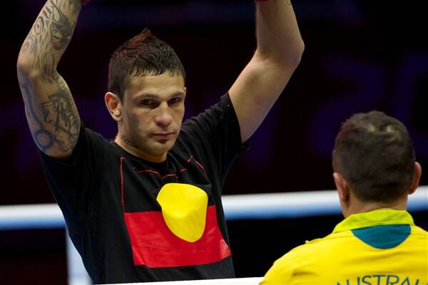 Aussie boxer Damien Hooper in his Aboriginal flag t-shirt, which has sparked controversy in London.