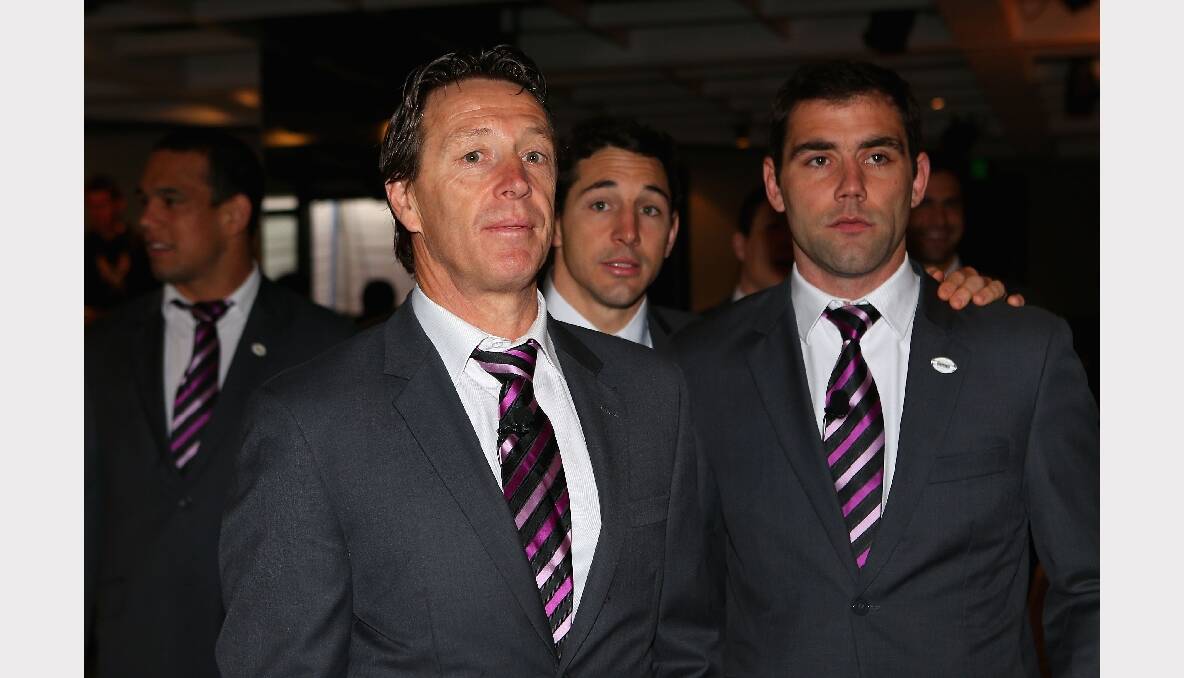 Storm coach Craig Bellamy, Billy Slater of the Storm and captain Cameron Smith look on during the 2012 NRL Grand Final breakfast. Photo: GETTY IMAGES