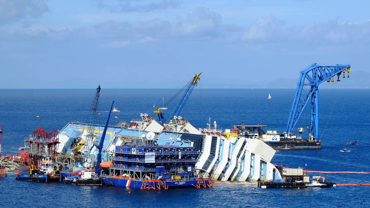 A 600 million euro operation ($862 million) to raise the 114,500 tonne Costa Concordia gets underway off the coast of Italy. Photos: REUTERS, GETTY IMAGES