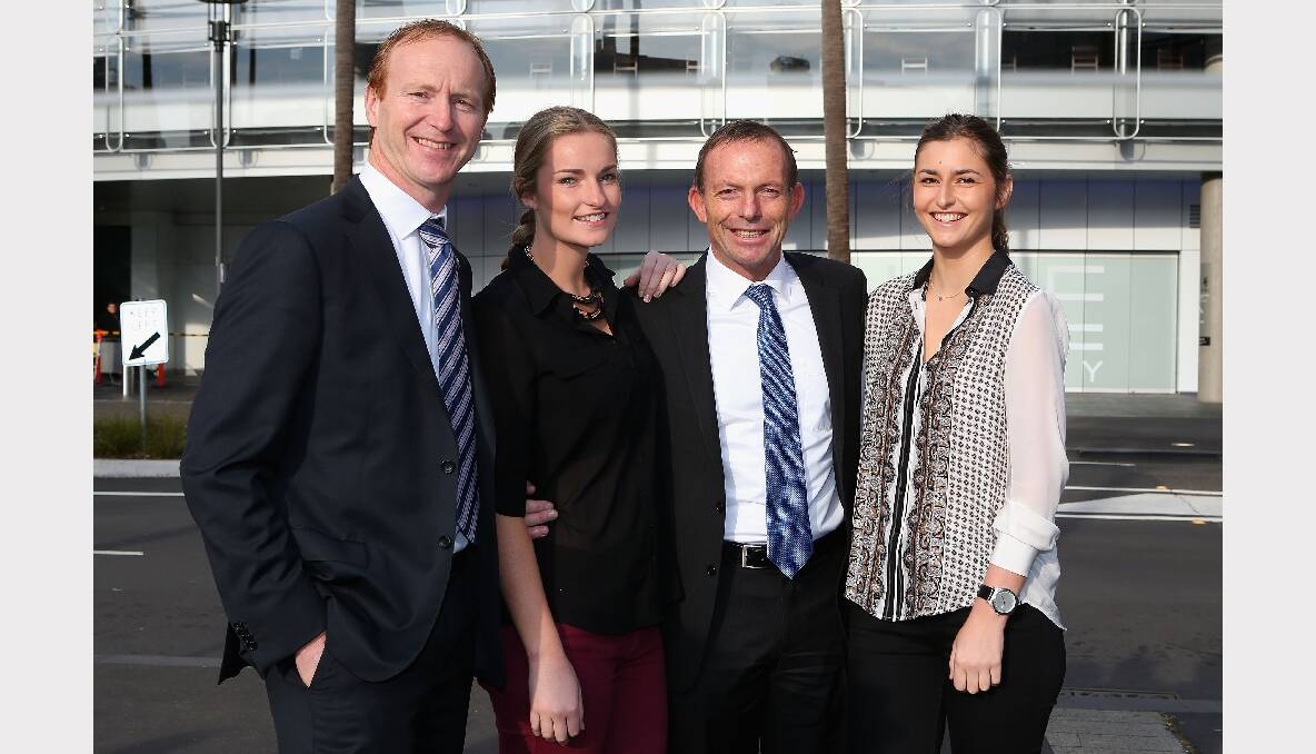 Interim NRL boss Shane Mattiske poses with Federal opposition leader Tony Abbott and his daughters Bridget and Frances. Photo: GETTY IMAGES 