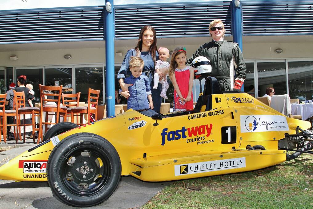 Megan Dixon's children in Cameron Walters Formula Ford championship winning car at the final Mum and Bubs High Tea at the Lagoon Seafood Restaurant.