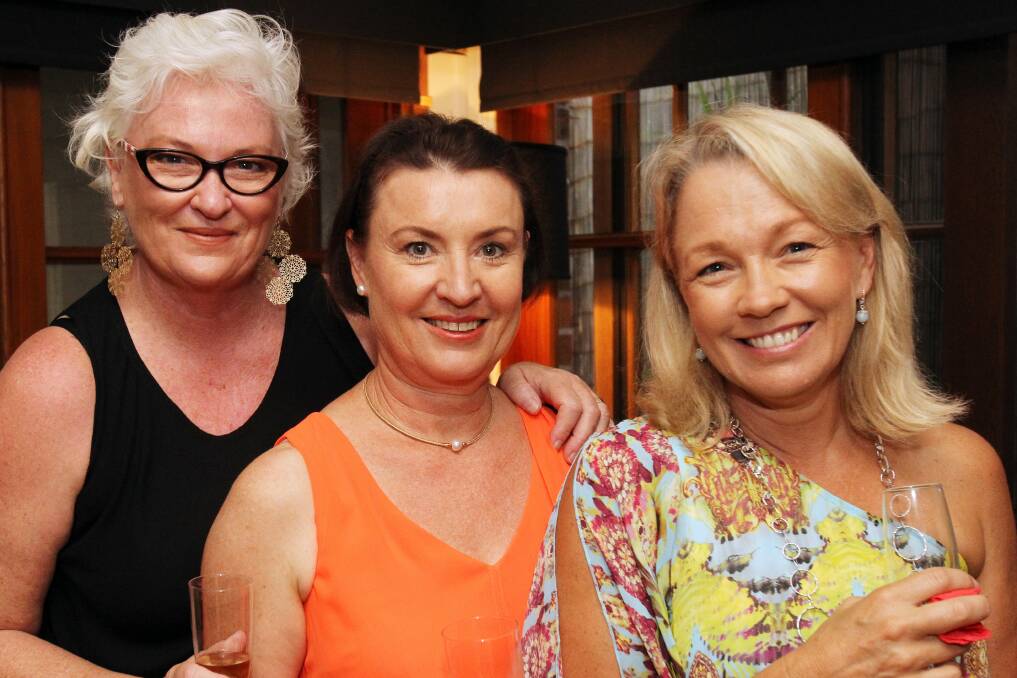 Janice Etheredge, Alyson Owensby and Amanda Moore at the Goslings' Christmas party.