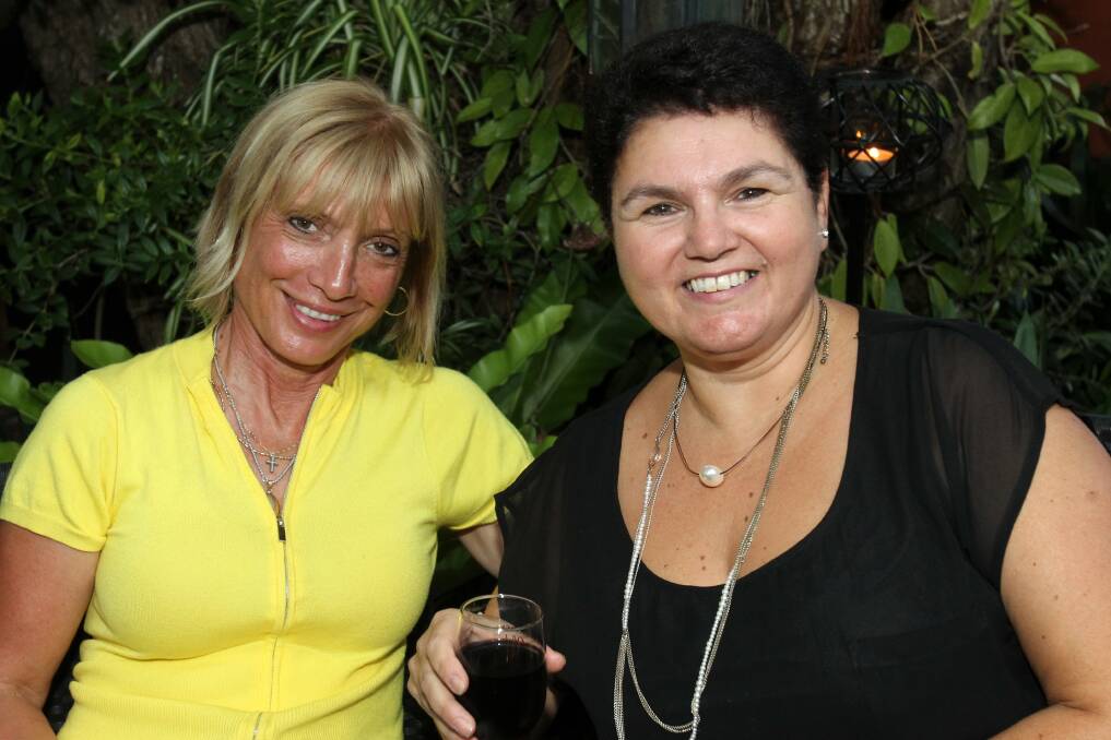 Rima Bronneberg and Margaret Lawer at the Goslings' Christmas party.