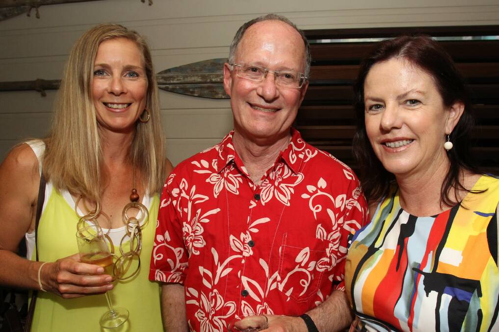 Jan Osborne, Dwain Owensby Sue Pescud at the Goslings' Christmas party.