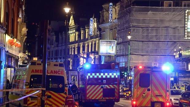 Emergency services attend the scene at the Apollo Theatre in Shaftesbury Avenue, central London. Photo: AP 