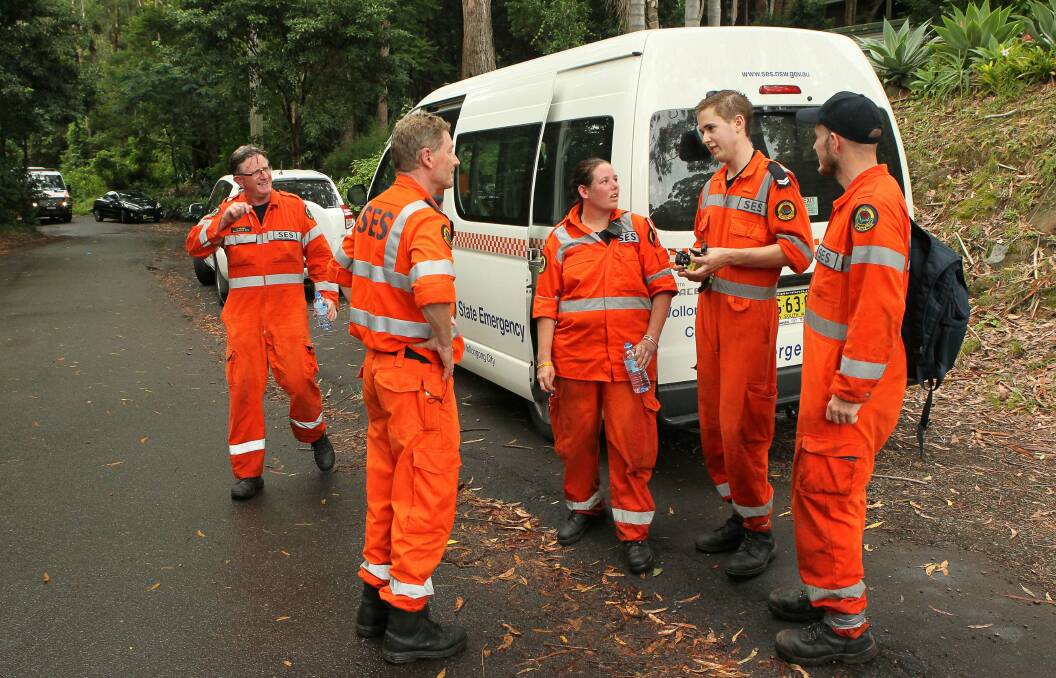 SES personnel near where Arno Badziong was found on the Gibson Track which branches off the Sublime Point track at Austinmer. Picture: KIRK GILMOUR