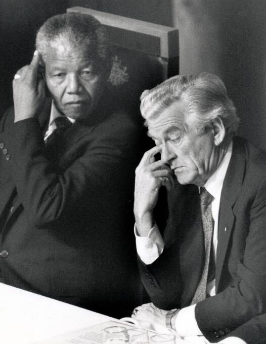Nelson Mandela with Prime Minister Bob Hawke at a press conference in Canberra (1990). Picture PETER COX