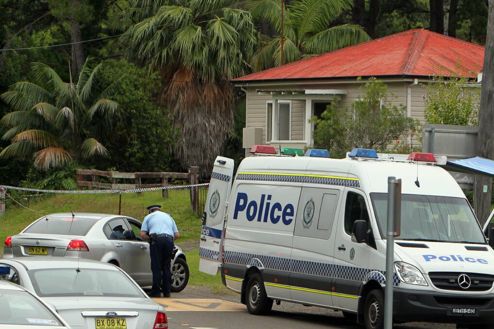 A crime scene has been established on the Bulli street where a woman's body was found on Friday. Picture KIRK GILMOUR