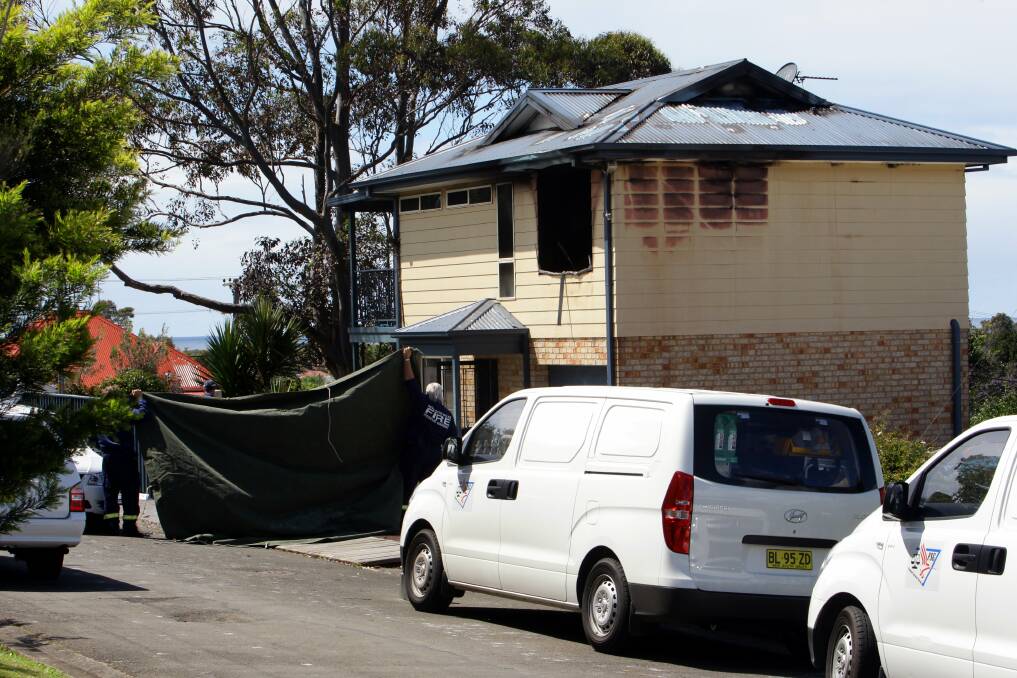 Police at the Corrimal house fire. Picture: KIRK GILMOUR