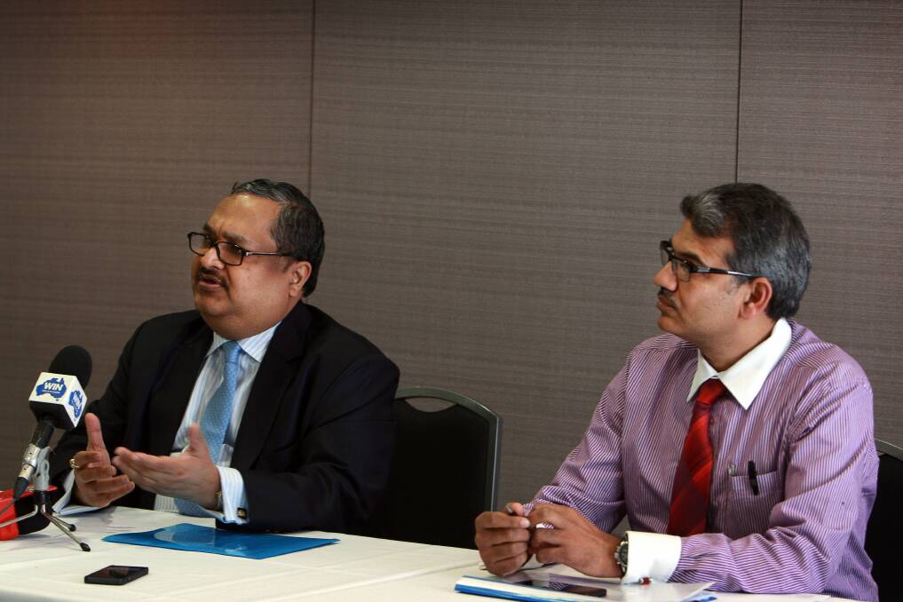 Arun Jagatramka and Gujarat NRE Coking Coal chairman Jasbir Singh at the Gujarat shareholders meeting in October. Picture SYLVIA LIBER