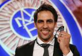 Mitchell Johnson poses after winning the Allan Border Medal during the 2014 Allan Border Medal on Monday night. Picture GETTY IMAGES
