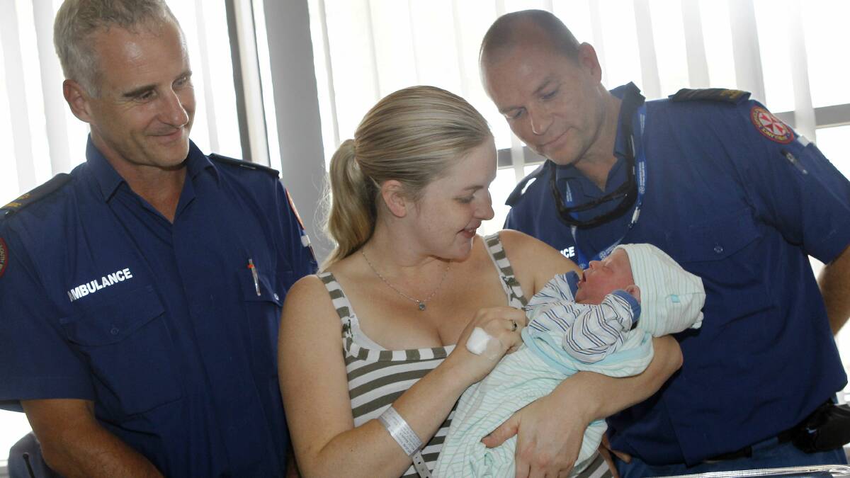 Paramedics Anton Jamsek, Rachelle Molloy with baby Dylan and paramedic Mick Rodgers. The paramedics helped  deliver baby Dylan at home. Picture: ANDY ZAKELI
