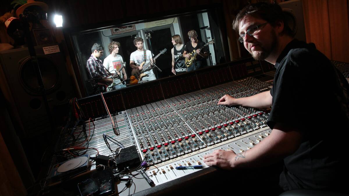 Main Street Studios owner Adam Jordan records the band Go Away, Everyone. Picture: KEN ROBERTSON