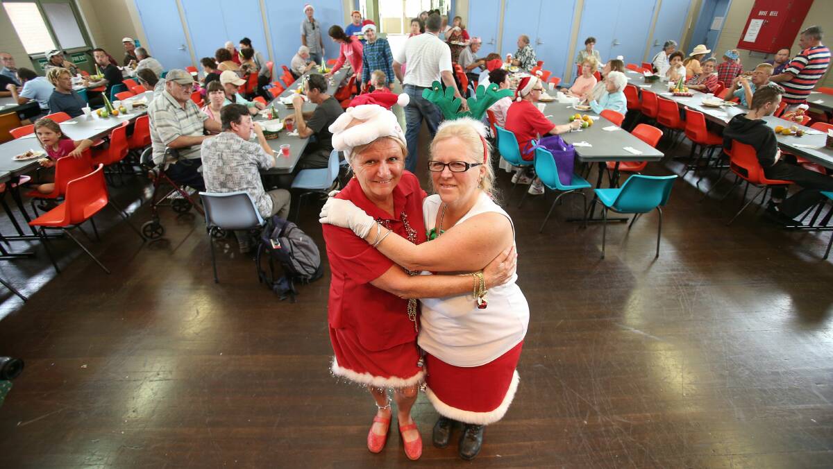 Maxyne Graham and Donna Walsh, who organise the Warrawong Community Centre Community Kitchen program, are concerned this year's Christmas event may be the last. PICTURE: KIRK GILMOUR